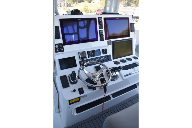 Slide: The Image of Cockpit of 2021 Cape Horn 36 XS boat with advanced navigation systems and controls. - 19