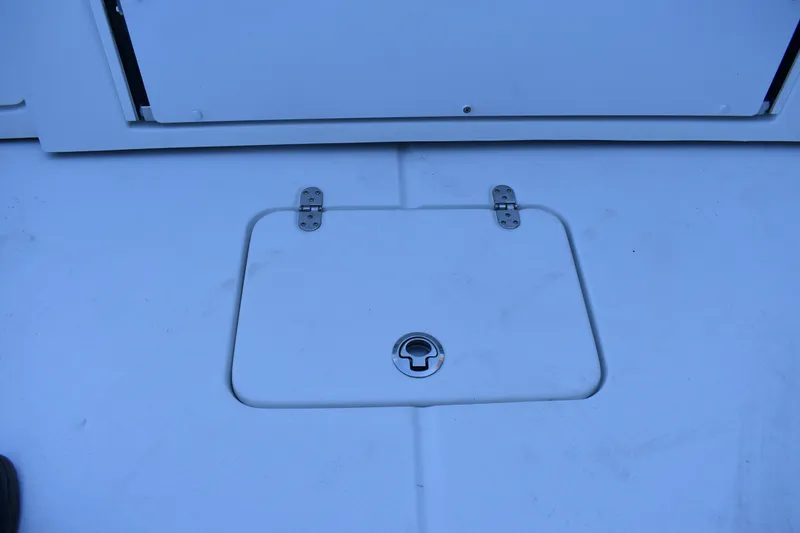 Slide: The Image of 2021 Cape Horn 36 XS boat deck hatch with metal hinges and latch. - 30
