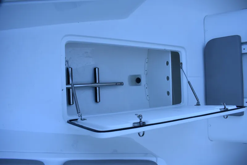 Slide: The Image of Open storage compartment on 2021 Cape Horn 36 XS boat, showcasing interior details. - 37