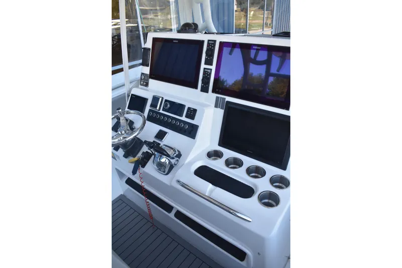 Slide: The Image of 2021 Cape Horn 36 XS boat dashboard with modern controls and displays. - 18