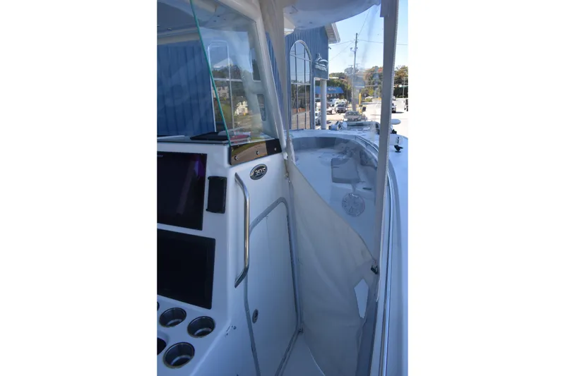 Slide: The Image of 2021 Cape Horn 36 XS boat interior with console and seating area. - 23