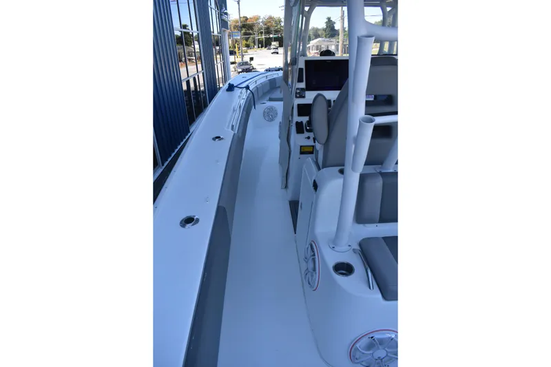Slide: The Image of 2021 Cape Horn 36 XS boat interior with seating and control panel. - 25