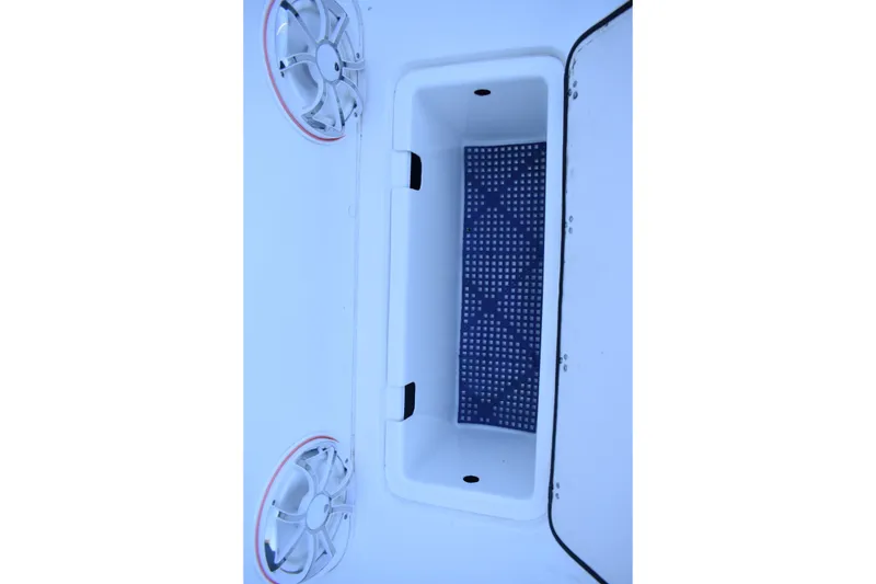 Slide: The Image of 2021 Cape Horn 36 XS boat storage compartment with speakers, interior view. - 34
