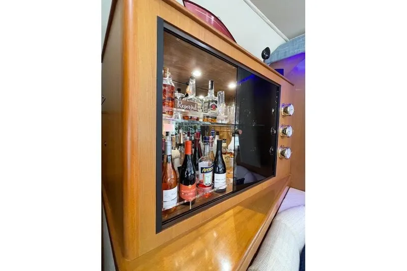 Slide: The Image of Luxurious bedroom interior of 2003 Post Flybridge Convertible yacht with cozy bedding. - 21