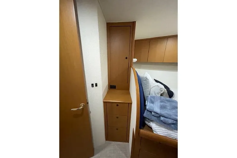 Slide: The Image of Bathroom interior of 2003 Post Flybridge Convertible yacht with shower and wooden flooring. - 31