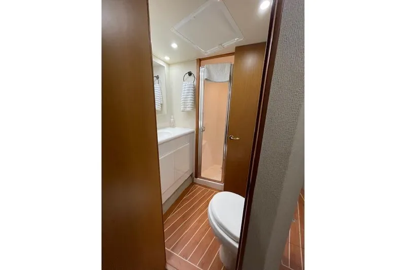 Slide: The Image of Luxurious bathroom in 2003 Post Flybridge Convertible yacht with modern fixtures and elegant design. - 32