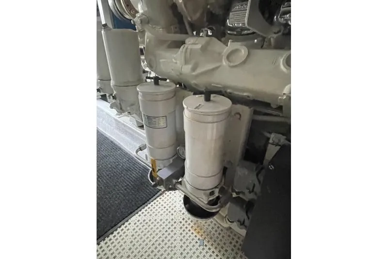 Slide: The Image of Engine room piping in a 2003 Post Flybridge Convertible boat. - 58