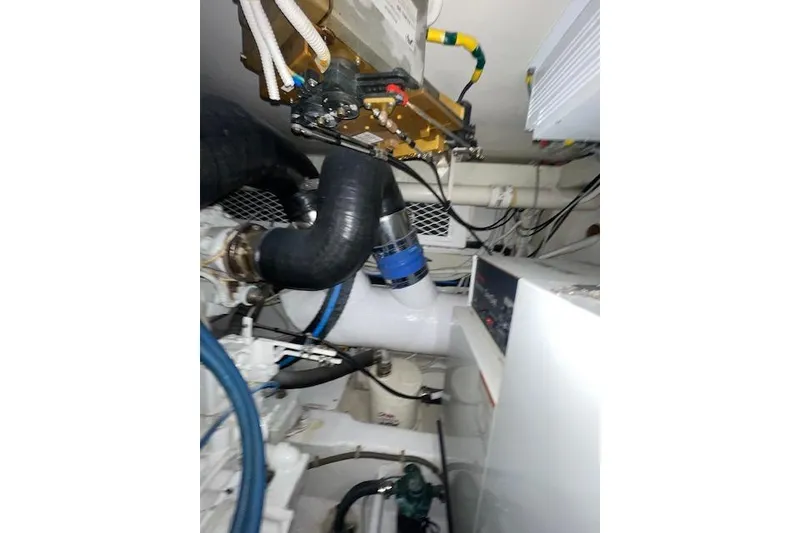 Slide: The Image of 2003 Post Flybridge Convertible boat interior with ladder and equipment. - 66