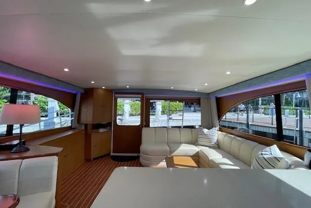 Slide: The Image of Luxurious interior of 2003 Post Flybridge Convertible yacht with plush seating and modern design. - 8