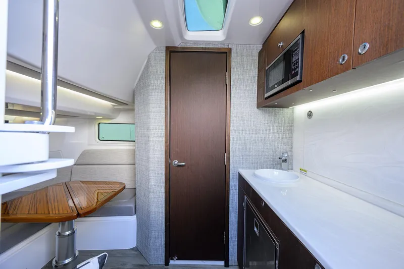 Slide: The Image of Luxurious interior of 2024 Everglades 455 Center Console boat with modern amenities. - 38