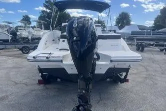 Slide: The Image of 2023 Sea Ray SPX 210 Outboard boat, rear view, parked on a trailer. - 5
