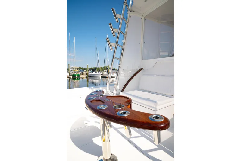 Slide: The Image of Luxurious 2026 Front Runner 47' Walk Around yacht with elegant seating and rod holders. - 10