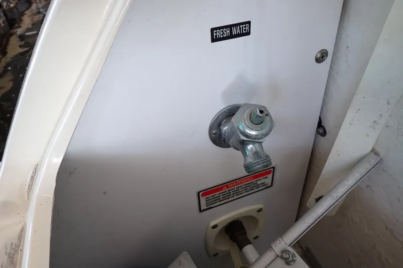 Slide: The Image of Fresh water outlet on 2002 Sea Ray 340 Sundancer boat. - 122