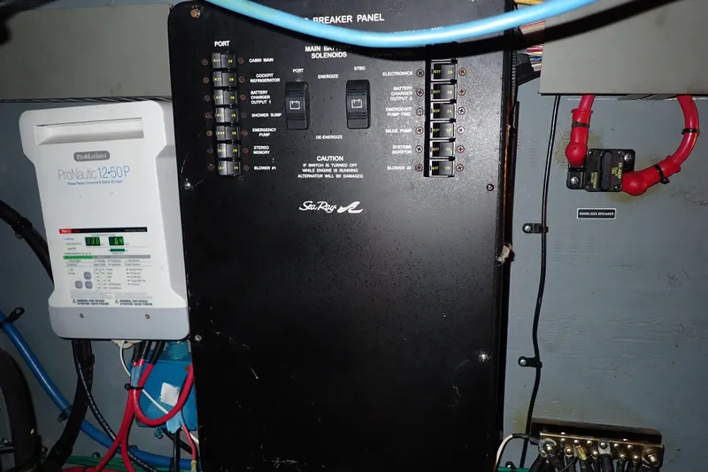 Slide: The Image of Electrical panel of 2002 Sea Ray 340 Sundancer boat with ProNautic charger. - 137