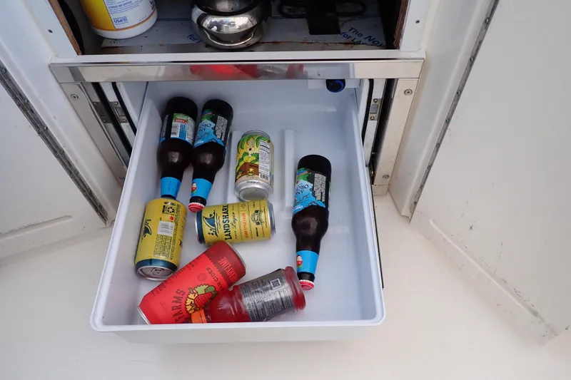 Slide: The Image of Refrigerator on 2002 Sea Ray 340 Sundancer with assorted drinks inside. - 50