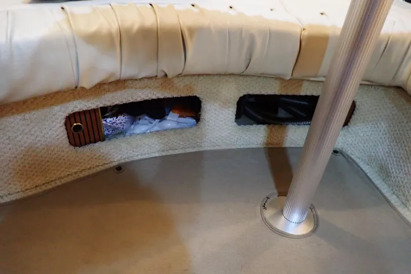 Slide: The Image of Interior storage compartments on a 2002 Sea Ray 340 Sundancer boat. - 98