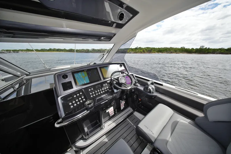 Slide: The Image of Modern helm of 2023 Galeon 400 XL yacht with advanced navigation systems. - 18