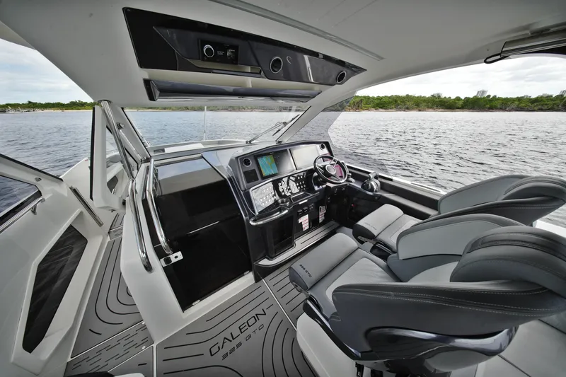 Slide: The Image of Interior of 2023 Galeon 400 XL yacht with modern helm and luxurious seating. - 21
