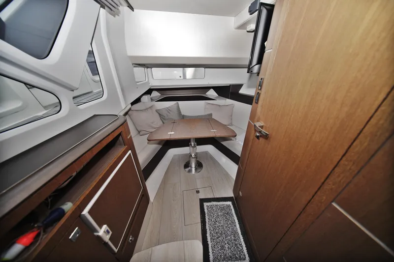 Slide: The Image of Luxurious interior of 2023 Galeon 400 XL yacht, featuring cozy seating and modern design. - 33