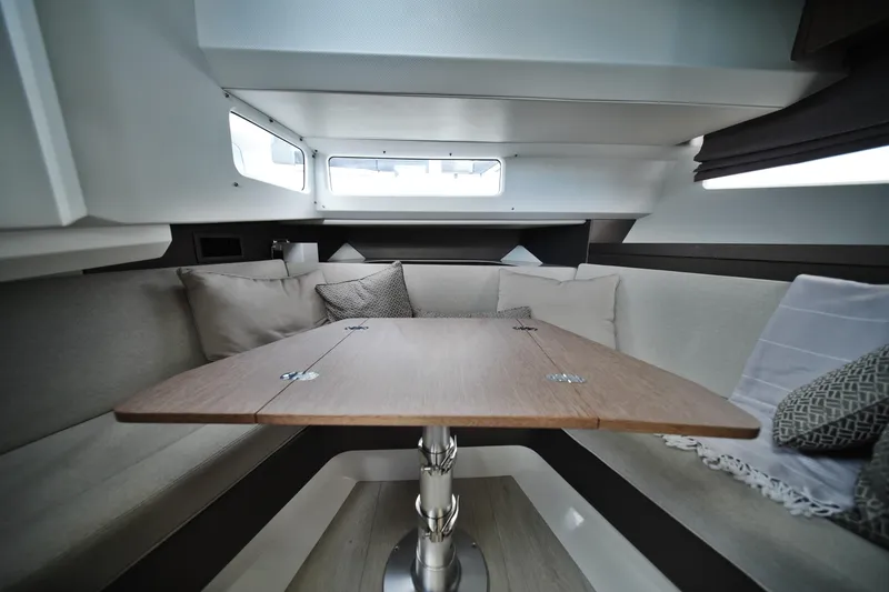 Slide: The Image of Luxurious interior of 2023 Galeon 400 XL yacht with elegant seating and wooden table. - 34