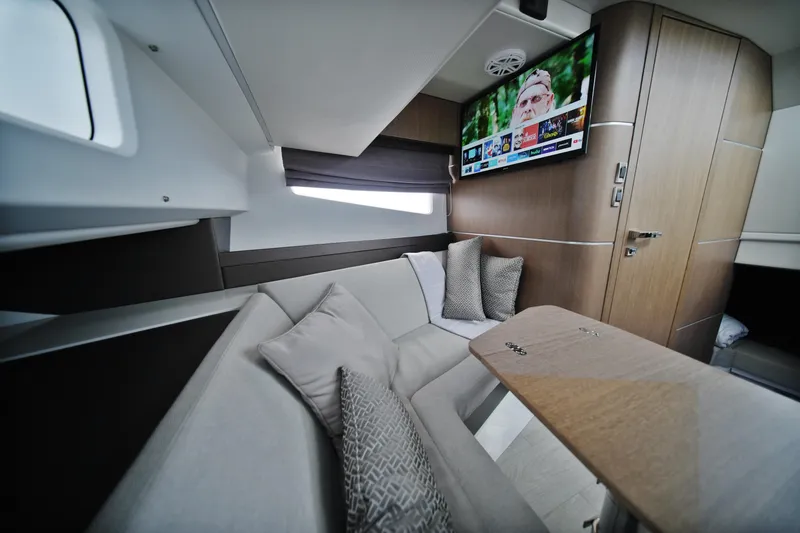 Slide: The Image of Luxurious interior of 2023 Galeon 400 XL yacht with cozy seating and modern TV. - 35