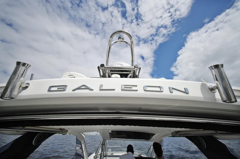 Slide: The Image of 2023 Galeon 400 XL yacht against a cloudy sky backdrop. - 7