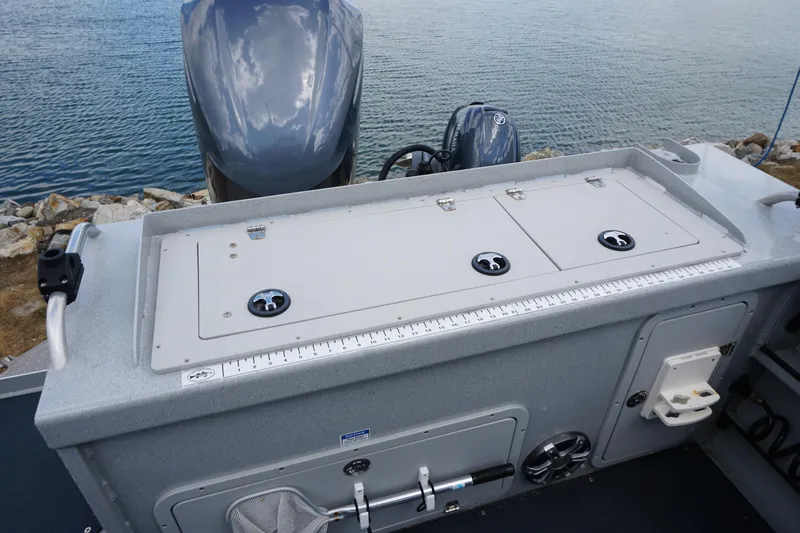 Slide: The Image of 2023 Weldcraft 220 Ocean King boat with fishing station and dual outboard motors. - 7