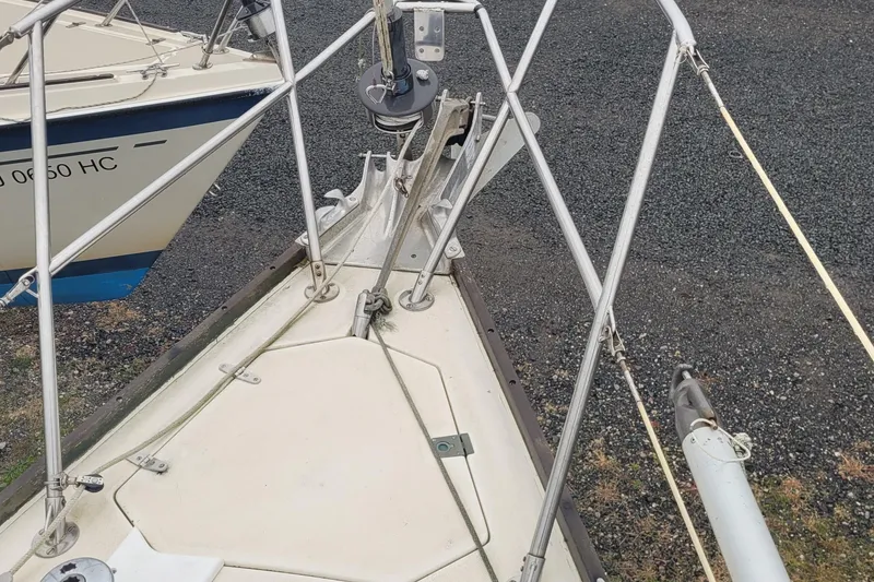 Slide: The Image of Bow of 1986 Sabre 34 sailboat with stainless steel rigging and anchor setup. - 10