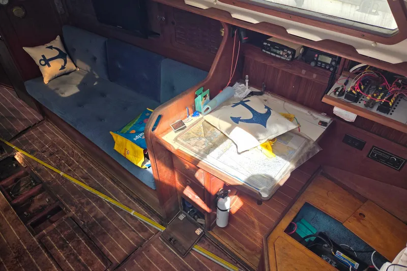 Slide: The Image of Interior of 1986 Sabre 34 sailboat with nautical decor and navigation equipment. - 39