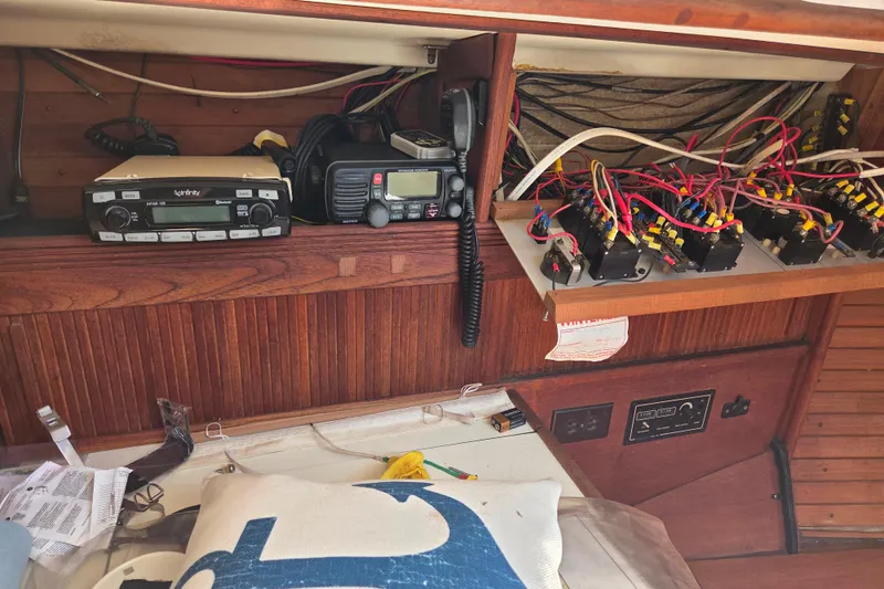 Slide: The Image of Electrical panel and radio equipment inside a 1986 Sabre 34 sailboat cabin. - 44