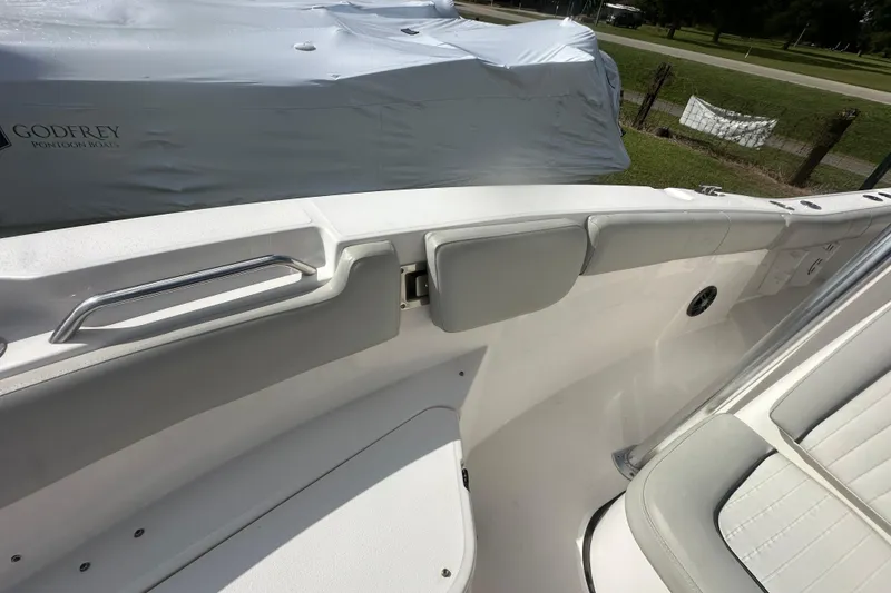 Slide: The Image of 2023 Sea Fox 228 Commander boat interior with seating and railing details. - 23