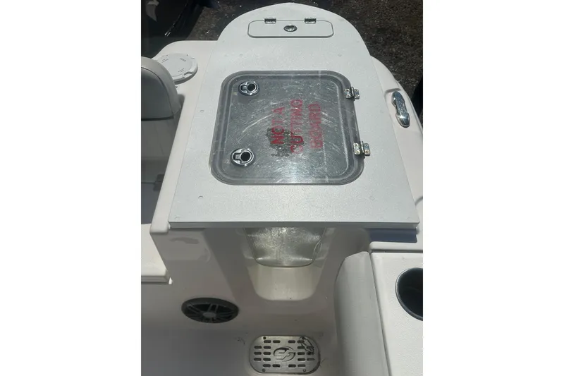 Slide: The Image of 2023 Sea Fox 228 Commander boat with a cutting board and storage compartment. - 33