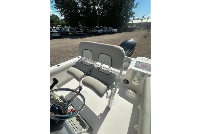 Slide: The Image of 2023 Sea Fox 228 Commander boat interior with dual seats and steering wheel. - 34