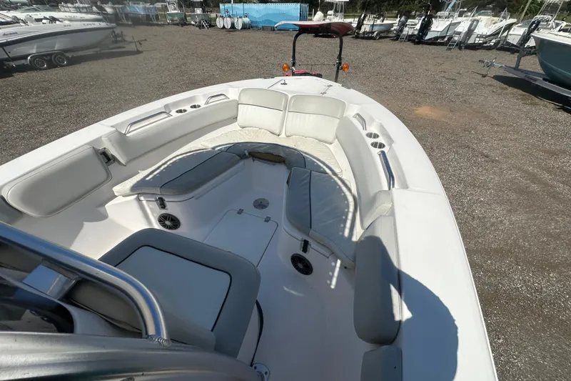 Slide: The Image of 2023 Sea Fox 228 Commander boat interior with cushioned seating and storage compartments. - 42