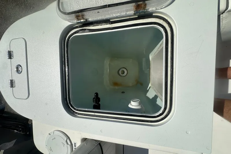Slide: The Image of Open storage compartment on 2023 Sea Fox 228 Commander boat, showcasing interior details. - 53