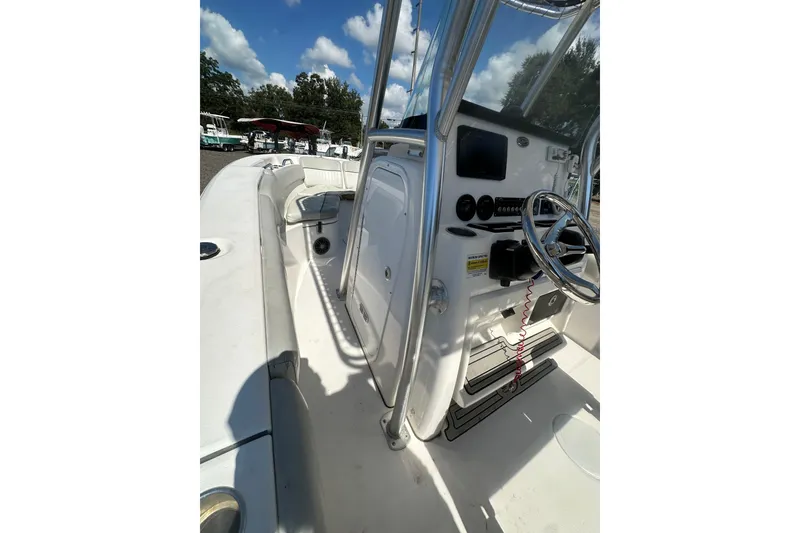 Slide: The Image of 2023 Sea Fox 228 Commander boat interior with steering console and seating. - 54