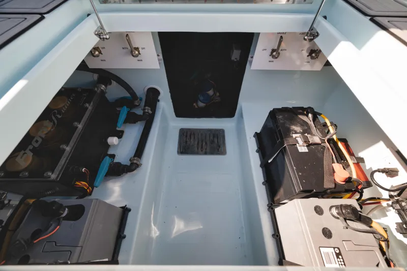 Slide: The Image of Interior view of 2026 Front Runner 39' Center Console boat's engine compartment. - 8