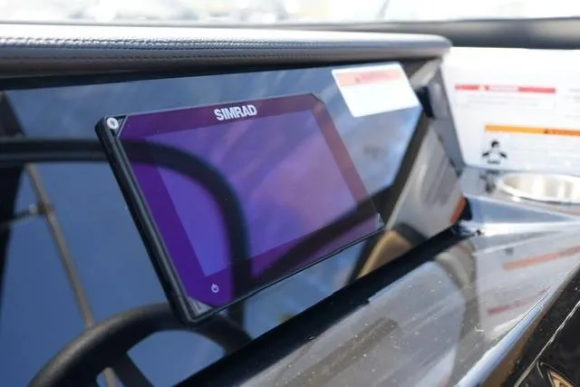 Slide: The Image of Simrad display on 2026 Sea Ray SPX 210 boat dashboard. - 31