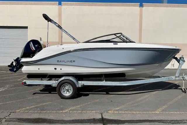 The Image of 2025 Bayliner V20 boat on trailer, parked outdoors, side view. - 0