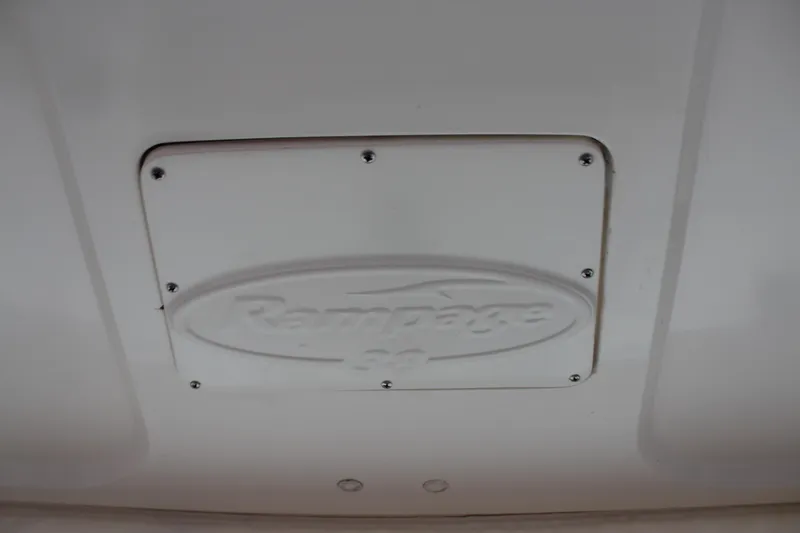 Slide: The Image of 2005 Rampage 38 Express logo on a white panel with screws. - 13