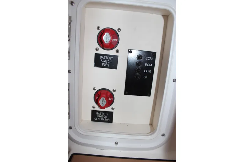 Slide: The Image of Battery switches and control panel on a 2005 Rampage 38 Express boat. - 20
