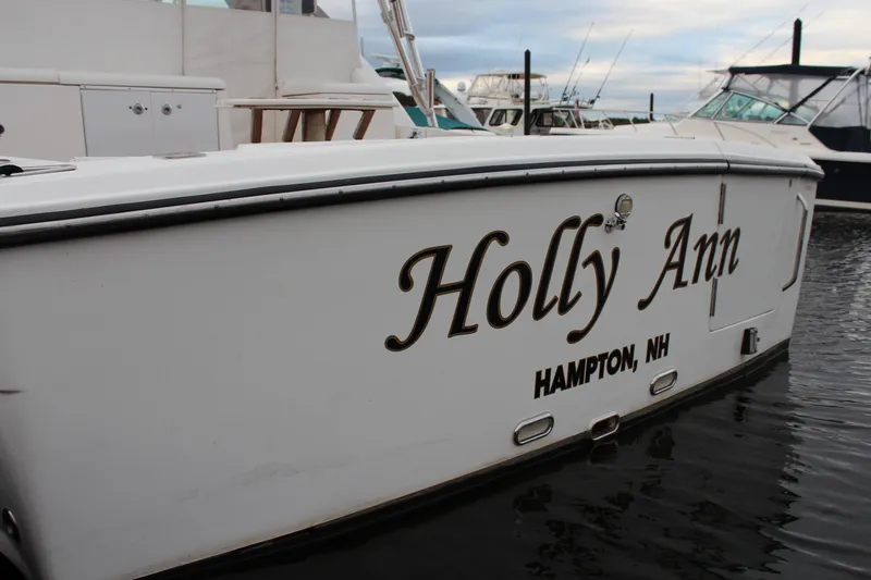 Slide: The Image of 2005 Rampage 38 Express boat named "Holly Ann" docked in Hampton, NH. - 3