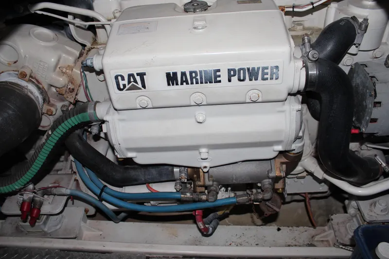 Slide: The Image of CAT Marine Power engine in a 2005 Rampage 38 Express boat. - 34