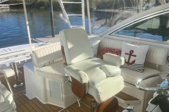 Slide: The Image of Luxurious 2005 Rampage 38 Express yacht interior with plush seating and nautical decor. - 44