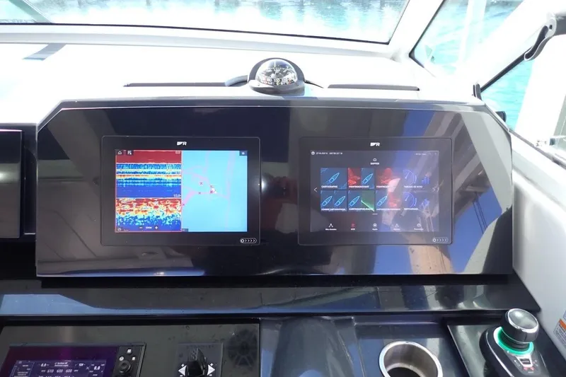 Slide: The Image of Dashboard of 2023 Formula 380 Super Sport Crossover OB with navigation screens. - 6
