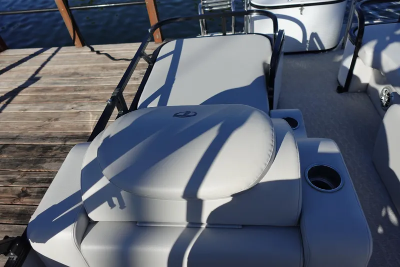 Slide: The Image of 2020 Tahoe Pontoon 2485 LTZ Rear Lounger with comfortable seating and cup holders. - 23