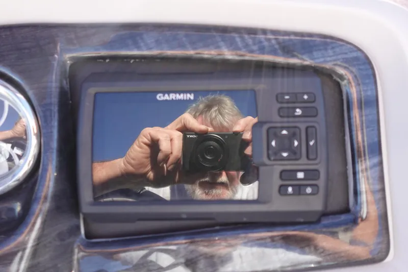 Slide: The Image of Reflection in Garmin display on 2020 Tahoe Pontoon 2485 LTZ Rear Lounger dashboard. - 29