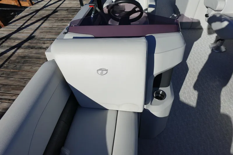 Slide: The Image of 2020 Tahoe Pontoon 2485 LTZ Rear Lounger interior with steering wheel and seating. - 34