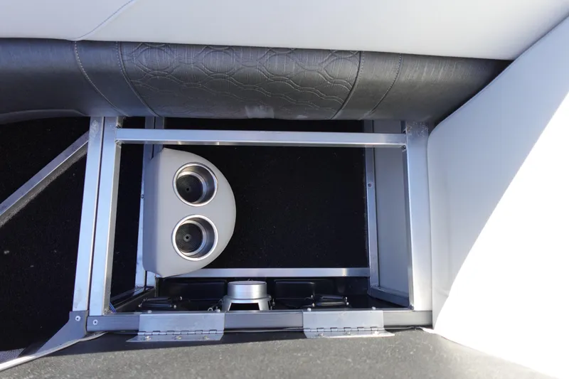 Slide: The Image of 2020 Tahoe Pontoon 2485 LTZ Rear Lounger cup holders and storage compartment. - 37