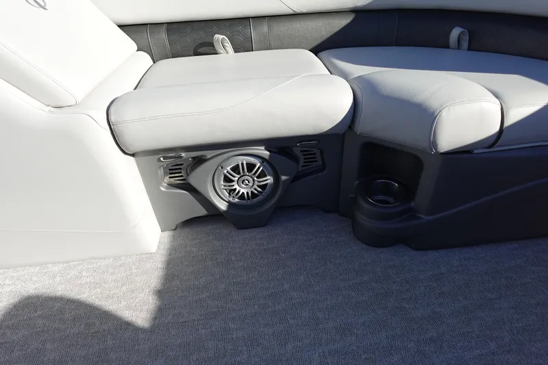 Slide: The Image of 2020 Tahoe Pontoon 2485 LTZ Rear Lounger interior with speaker and cup holder. - 41